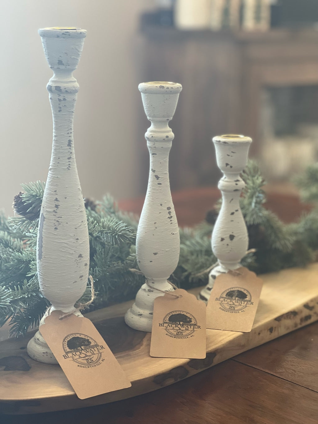 Set of 3 rustic wood candlesticks – farmhouse home décor, 7", 9-1/4", 11-1/4"

Handcrafted wooden candlesticks in rustic farmhouse style for table centerpiece

Rustic wood candlesticks displayed on mantel – set of 3 varying heights

Farmhouse décor wooden candle holders – small, medium, large candlesticks

Handcrafted rustic candlestick set – wooden home accents for shelves or tables

Vintage style wooden candlesticks – rustic farmhouse home décor set of 3

Solid wood candlesticks with layered heights – per