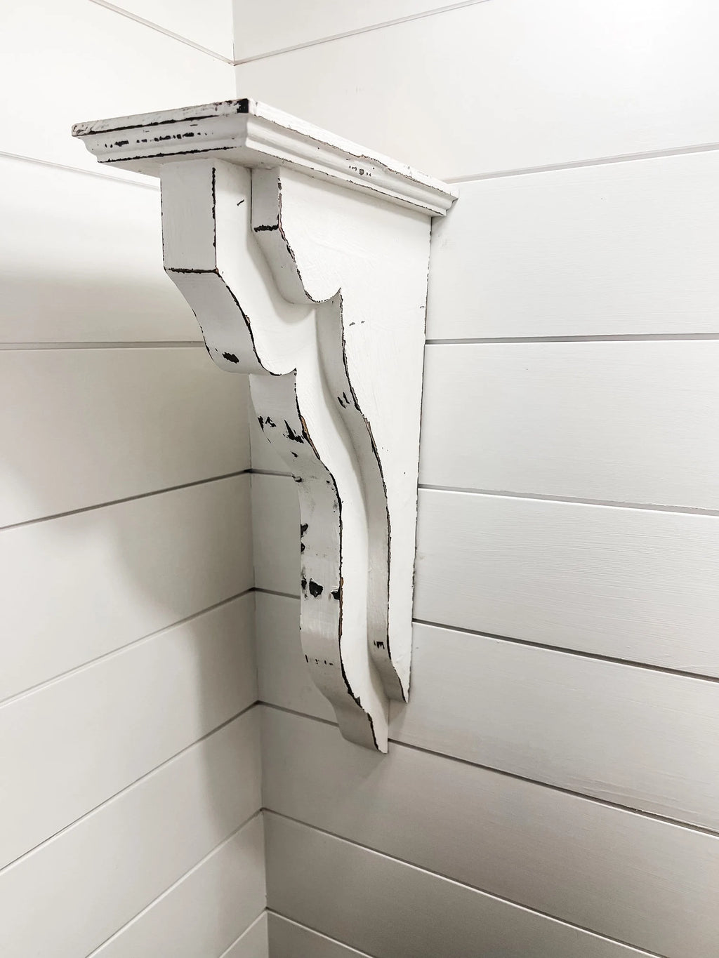 Pair of white distressed wood corbels with sleek minimalist line design

French and Italian country style rustic wood corbels for mantel or shelf support

Decorative white distressed wood corbels with clean, modern lines